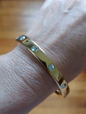 Monet Gold Plated Crystal Bangle Bracelet (1 missing Stone)